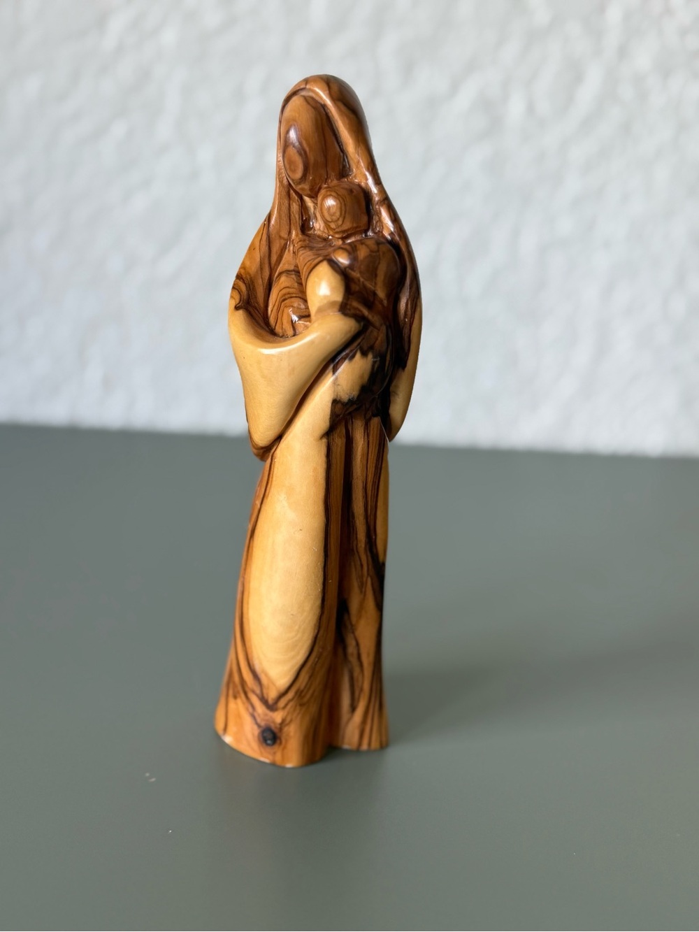 Hand crafted Olive wood statue of the Virgin Mary holding Jesus faceless